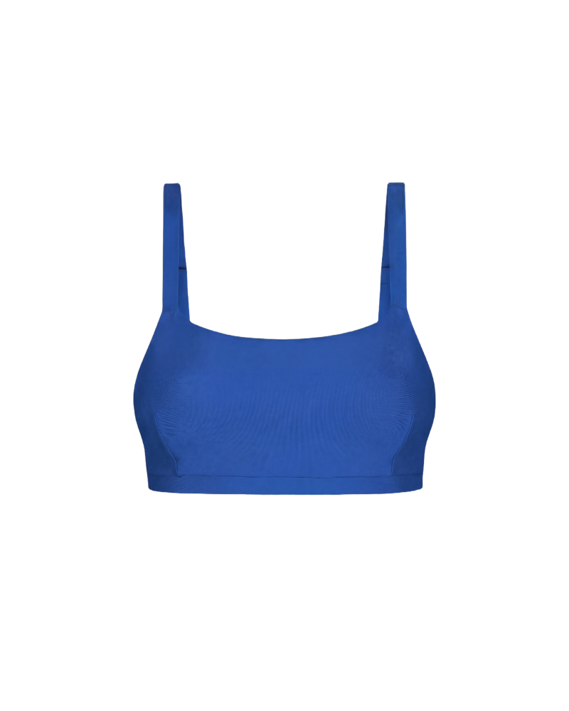 Royal blue cropped top with textured fabric and wide shoulder straps, front view, minimalist design